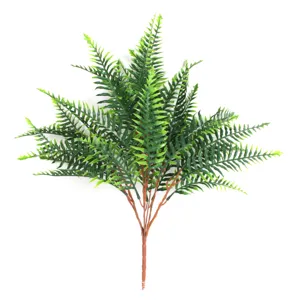 Close-up detail of artificial Boston fern plastic foliage green leaves plant decoration