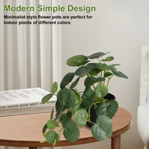 Macro view of a minimalist artificial potted plant on a wooden table for home decor
