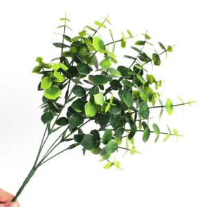 Lush green artificial eucalyptus stems with money leaf design for indoor floral decor