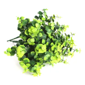 Detailed view of artificial eucalyptus bouquet with vibrant green leaves for home decor