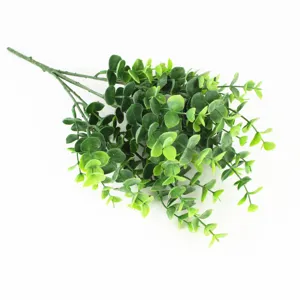 Artificial eucalyptus money leaf plant branch detail showing realistic green foliage texture.