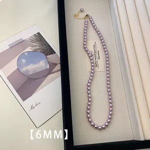 Detail of 6mm lavender pearl necklace on jewelry display tray