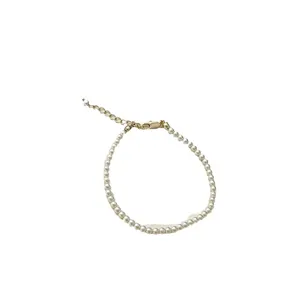 Elegant white pearl choker necklace with adjustable gold clasp for women