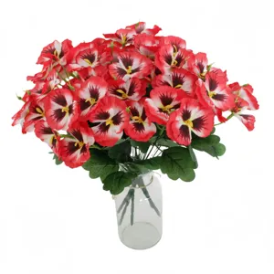 Artificial pansy flower bouquet in glass vase for home decor and indoor floral arrangement.