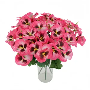 Artificial pansy bouquet detail view, pink silk flowers in glass vase for home decor