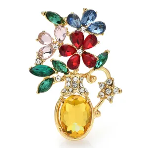 Detailed view of elegant floral vase brooch with colorful sparkling crystals