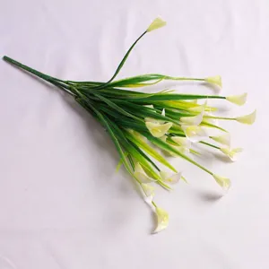 Detailed view of high-quality artificial 5-fork calla lily flowers with green grass stems