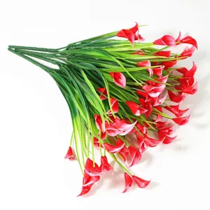 Detailed macro view of red calla lily artificial flowers with green stems