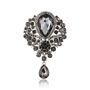 Broche vintage en cristal gris fumé en forme de goutte avec monture en strass