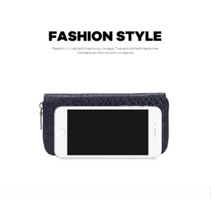 Blue crocodile pattern women's long wallet shown with a phone for size reference
