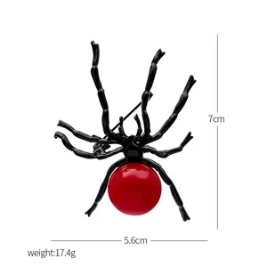 Détail de la broche araignée, dimensions : 7cm x 5,6cm, poids 17,4g, finition rouge et noir.