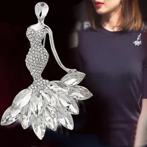 Elegant mermaid shaped silver brooch pin with shimmering white crystal rhinestones