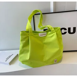 Bolso tote de lona verde neón para mujer, bolso de hombro grande y casual de compras.