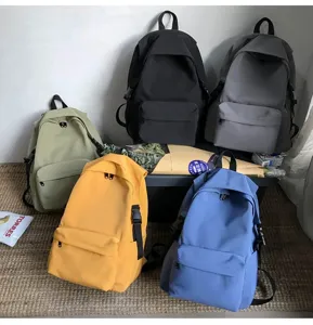 Detailed showcase of lightweight water-repellent nylon backpacks in five vibrant colors