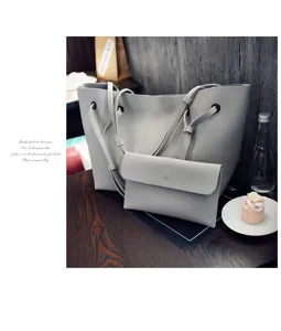 Klassische graue Beutel-Tasche aus Narbenleder mit passender Tasche, stilvoller Shopper.