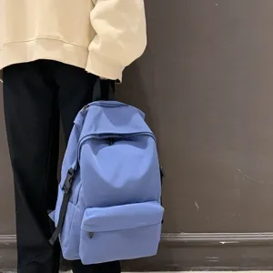 Stylish light blue water-resistant nylon backpack for school and casual daily use