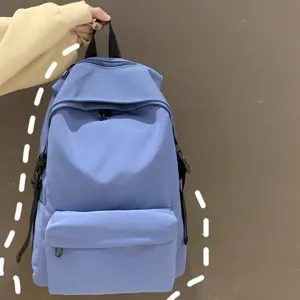 Water-resistant light blue nylon backpack for high school and university students