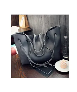 Elegante graue Damentasche aus Leder, geräumige Alltagsumhängetasche im schlichten Design.