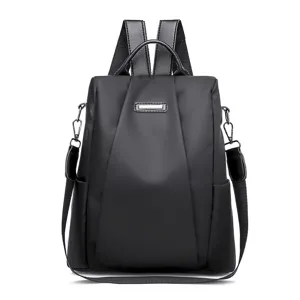 Black anti-theft backpack for women, stylish nylon fabric travel school bag daily use.