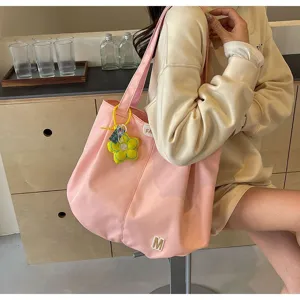 Bolso tote de lona rosa con colgante de flor amarilla, gran bolso de hombro casual.