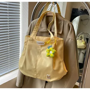 Bolso tote de lona fresco estilo japonés de gran capacidad para estudiantes y uso diario.