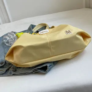 Bolso de hombro de lona amarilla casual, gran capacidad para uso diario y estudiantes.