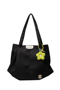 Bolso tote de lona negro con colgante de flor amarilla, bolso de hombro grande casual.