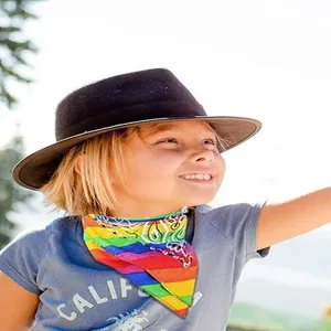 Rainbow striped paisley bandana scarf detail, colorful festival hair wrap and headwear.