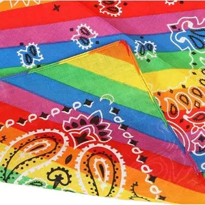 Colorful rainbow paisley bandana detail view, vibrant striped pattern fabric close up shot.