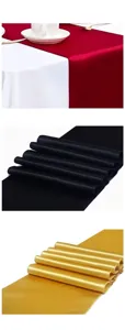 Detailansicht von Satin-Tischläufern in Rot, Schwarz und Gold mit feiner Kantenverarbeitung.