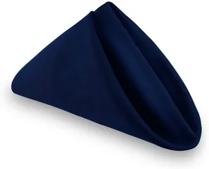 Navy blue satin cloth napkin detail, smooth texture fabric for hotel table setting and wiping.