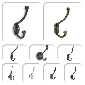Collection of vintage European style wall hooks in various antique finishes and shapes.