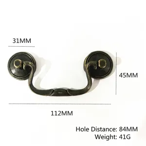 Macro view of vintage bronze zinc alloy furniture handle with dimensions and hole spacing