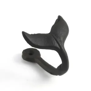 Vintage cast iron whale tail wall hook with rustic black finish for home decor