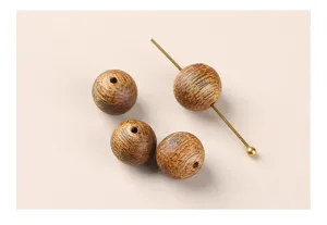 Macrodetail van de natuurlijke nerf van Qinan agarhout ronde kralen voor DIY sieraden
