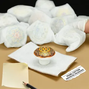 Bohemian ceramic drawer knob with intricate yellow and orange mandala pattern.