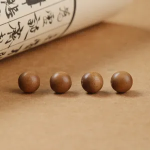 Four premium natural sandalwood loose beads for DIY jewelry making and Buddhist prayer crafts.