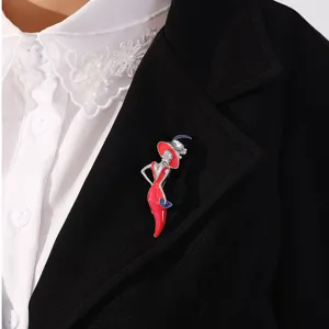 Detailed macro view of an elegant lady enamel brooch with a red hat on a blazer