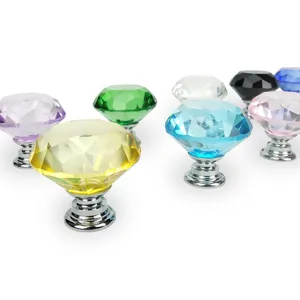 Close-up detail of colorful diamond-shaped crystal cabinet knobs with chrome bases