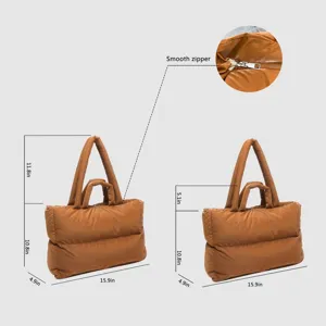 Detailed product dimensions of a brown space cotton puffer tote bag with smooth zipper