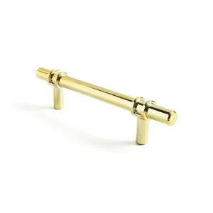 Tirador de mueble moderno en oro pulido para cajones y puertas de armarios de lujo.