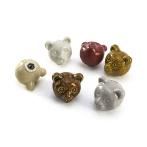 Set of diverse animal-shaped ceramic knobs for kid's room drawers and wardrobe cabinets