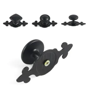 Set of vintage European style black cabinet knobs with decorative backplate detailing