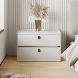 Detail shot of retro woven ceramic drawer handle installed on modern white nightstand.
