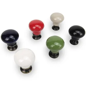 Set of six colorful ceramic cabinet knobs with vintage bronze base for drawers and wardrobes.