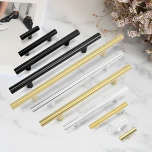Modern stainless steel cabinet handles in black, gold, and silver finishes for drawers