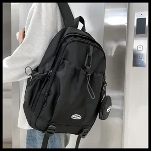 Sac à dos noir grande capacité pour étudiants avec cordon de serrage et mini pochette