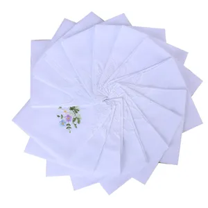 Mouchoir de dame en coton blanc brodé de dentelle élégant cadeau floral délicat.