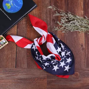 Close-up of a versatile American flag printed cotton bandana on a rustic wooden background