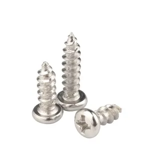 Close-up of three silver Phillips head self-tapping screws on a white background.
